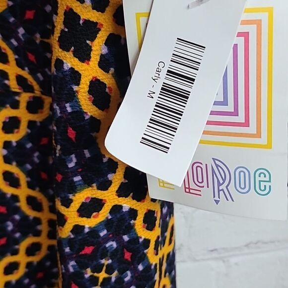 LuLaRoe Carly Jacquard Dress M 10/12 Black Tribal Tile Midi Pocket High Low NWT - Picture 2 of 10